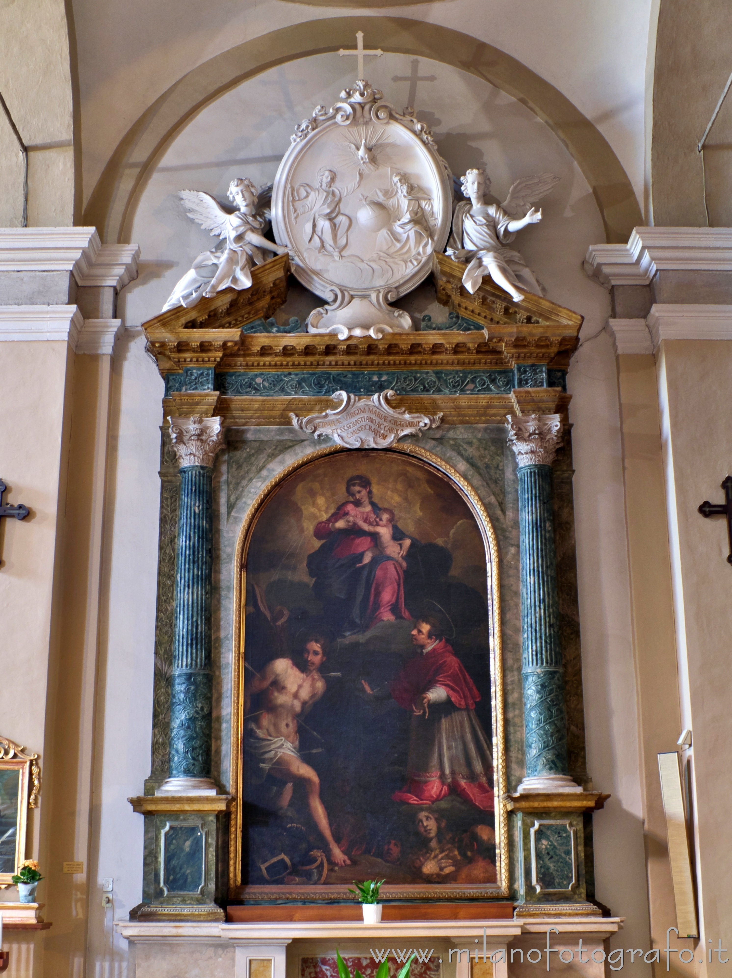 Fano (Pesaro e Urbino, Italy) - Altar of the Nursing Virgin with the Saints Sebastian and Carlo in the Basilica of San Paterniano